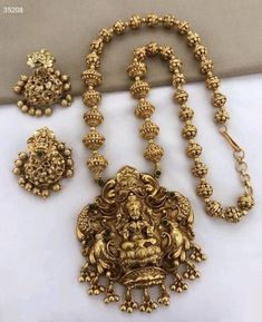 Material:- Brass, Gold Platted Pack- Necklace Set These Beautiful Gold Platted Necklace Best for gifting and personal use, You can gift your Girlfriend, Mother, Sister , Relatives , Neighbours etc. Combine it with Matching Dress and be the Limelight of every Occasion ( Diwali, Birthday, Anniversary, Christmas, Any Ritual Festival). Suitable for all Occasions. a)These are very skin Friendly. b)The plating is Non- Allergic and safe for all Environment. Gift for Her, Best Friend Gift, Gift Ideas, V Heavy Gold Jewelry For Navratri, Gold Jewelry For Navratri, Gold Jewelry For Navratri Festival, Traditional Gold Plated Locket Jewelry, Traditional Gold-plated Locket Jewelry, Traditional Gold Plated Coin Pendant Jewelry, Gold Long Necklace For Diwali, Traditional Locket Jewelry For Navratri, Gold Long Necklace Temple Jewelry Set