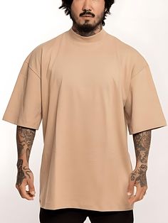 Camiseta Oversized Bege Larga Streetwear Moda Masculina Street oversize Street Moda  Camisetas  Oversized se caracteriza por ser mais alongada e também com mangas até o cotovelo, conhecida como modelo streetwear.  - Modelagem Oversized ( proporcionando maior conforto a peça ) - Cobre gola de ombro a ombro - Costura dupla e reforçada - Tecido 100% Algodão Premium - 180 gramatura - Malha com tingimento reativo, não desbota  *Envio Rápido*   ⦁	Tamanho P: Com 73cm de altura, 58cm de largura e 24cm m Mockup, Mock Up