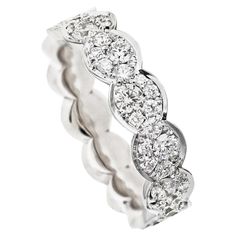 Mosaic set Diamond Eternity Stacking Ring, handmade in Belgium by jewellery artist Joke Quick. patiently set with white DEGVVS brilliant-cut diamonds 0.78 ct. in different sizes. The ring is set with diamonds up to just over halfway. 18K White gold 5.3 gram. White DEGVVS brilliant-cut diamonds 0,78 carat. Size EU 54 US 6 3/4 This ring can be custom made with a different color gold, other color gemstones or fancy color diamonds. Dimensions: Width: 5.14 mm. / 0.202 inch ; hight : 1.7 mm / 0.069 in Artist Joke, Rings Diamond, Eternity Ring Diamond, Diamond Eternity, Fancy Color Diamonds, Stacking Ring, Artistic Jewelry, Ring Ring, Ring Handmade