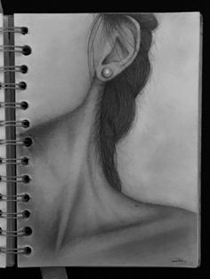 a pencil drawing of a woman's profile with ear piercings on her head