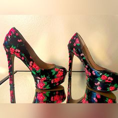 Brand New, Super Cute Betsey Johnson Platform Stiletto Heels In A Hard To Find Size 5. Signature Betsey Hot Pink Rose Print. Corset Ribbon Detail On The Back. Super Cute And Brand New Without Box. Synthetic Lining Synthetic Sole 5 Inch Heel Height 1.25 Inch Platform Height Imported Style Name: Bonnee Trendy Pink Heels With Floral Print, Black Floral Print Heels For Formal Occasions, Trendy Pink Floral Print Heels, Formal Black Heels With Floral Print, Fitted Pink Floral Heels, Black Floral Print Heels For Evening, Fitted Pink Floral Print Heels, Trendy Floral Print High Heels, Betsy Johnson Wedding Heels