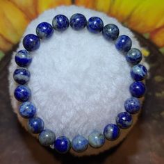 Bracelet Is Made From 8 Mm Gemstones. Lapis Lazuli - Encourages Self-Awareness, Allows Self-Expression & Reveals Inner Truth, Providing Qualities Of Honesty, & Compassion. All Gemstones Are Charged Under New/Full Moon, Sound Charged, & Reiki Infused. Blue Hypoallergenic Round Bracelets, Blue Crystal Bracelet With Natural Stones, Blue Round Crystal Bracelet For Spiritual Wear, Hypoallergenic Blue Round Bracelets, Blue Hypoallergenic Bracelets, Blue Hypoallergenic Round Stretch Bracelet, Blue Round Crystal Bracelet For Spiritual Style, Blue Round Crystal Bracelet For Healing, Spiritual Lapis Lazuli Crystal Bracelet For Healing