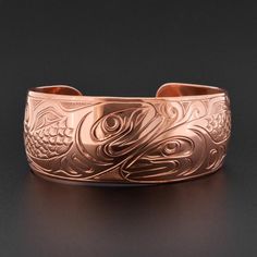 While used for different reasons regionally, the significance of copper along the Northwest Coast is widely recognized as an item of prestige and wealth. Originally acquired by coastal First Nations from open copper quarries controlled by First Nations of BC’s interior and Alaska, copper was once a rare metal in the region. Hammered copper cuffs are worn as a sign of status among First Nations people of the Northwest Coast, but copper is most well known as a shield-shaped and beaten object, some Engraved Bronze Copper Bracelets, Engraved Copper Bracelet Jewelry, Spiritual Bronze Copper Cuff Bracelet, Rose Gold Copper Cuff Bangle, Rose Gold Copper Bangle Cuff Bracelet, Engraved Copper Bracelet, Native Healing, Copper Cuff, Northwest Coast