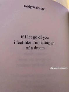 an open book with the words if i let go of you, i feel like i'm letting go of a dream