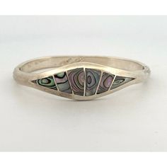 Transport Yourself To The Golden Era Of Mexican Craftsmanship With This Exquisite Vintage Alpaca Mexico Silver Bracelet. Crafted With Precision And Adorned With Mesmerizing Abalone Accents, This Cuff Bangle Bracelet Exudes Timeless Elegance And Cultural Richness. The Hinged Design Ensures A Comfortable Fit For Wrists Up To 6 Inches In Circumference, Making It A Versatile Addition To Any Jewelry Collection. Perfect For Adding A Touch Of Vintage Charm To Any Ensemble, This Estate Piece Captures The Essence Of Mexican Artistry And Craftsmanship. Features: Cuff Bangle Bracelet Size: Womens 6"In Condition: Pre-Owned Excellent Preowned Condition Poshmark Vintage Mexican Jewelry, Russian Jewelry, Mexican Jewelry, Cuff Bangle Bracelet, Cuff Bangles, Bracelet Sizes, Bangle Bracelet, Womens Jewelry Bracelets, The Golden