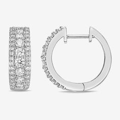 Features: Quick ShipEarring Back: HingedSetting: ProngStone Cut: RoundMetal Color: WhiteEarring Length: 17.1mmEarring Width: 6.1mmCare: Wipe CleanStone Type: 76 Cubic ZirconiaEarrings Style: Hoop EarringsMetal: Sterling SilverCountry of Origin: Imported White Pave Setting Hoop Earrings, White Hoop Earrings With Pave Setting, White Hoop Earrings With Channel Set, White Hoop Earrings Channel Set, White Channel Set Hoop Earrings, Modern Round Hoop Earrings With Pave Setting, Earrings Hoop, Cubic Zirconia, Hoop Earrings