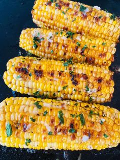 grilled corn on the cob with butter and parsley