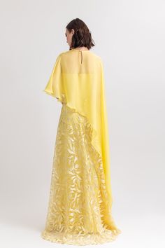 Description Yellow A-line, Long dress Cape shape, Short Sleeves Sweetheart neckline Embroidered lace, Chiffon Dry Clean Evening Dress Made in Lebanon EDSS23 1827LD Georgette Maxi Dress With Cape Sleeves, Georgette Dress With Ruffles And Cape Sleeves, Chiffon Gown With Cape Sleeves, Georgette Gown With Cape Sleeves, Elegant Lace Dress With Cape Sleeves, Organza Gown With Cape Sleeves, Elegant Yellow Floor-length Chiffon Dress, Summer Wedding Dress With Cape Sleeves, Spring Wedding Guest Dress With Cape Sleeves