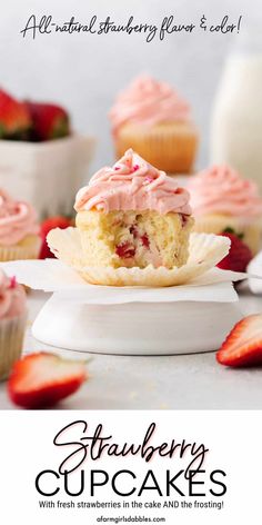 strawberry cupcakes with fresh strawberries in the background