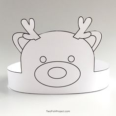 a paper cut out of a bear with antlers on its head