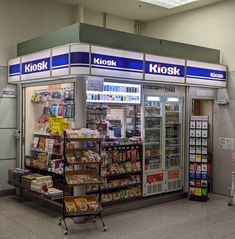 a kiosk with lots of food inside of it