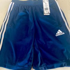 Mens Adidas Shorts. Navy, Size Small, Nwt. 9.5” Inseam Casual Adidas Blue Athletic Shorts, Casual Blue Adidas Athletic Shorts, Adidas Blue Shorts With Three Stripes, Adidas Blue Cotton Shorts, Adidas Blue Cotton Bottoms, Adidas Navy Cotton Bottoms, Blue Cotton Adidas Bottoms, Sporty Blue Short Pants, Navy Adidas