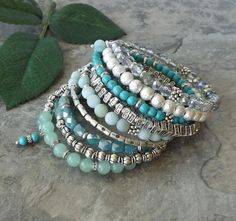 Leave an indelible mark on their minds each time you wear this unforgettable multi wrap aqua memory wire bracelet! At the same time exquisite and dramatic, its colors, style and design fashion a piece of statement jewelry that can be worn with everything from casual denim to dressy black . . . or give it as a Mothers Day gift- shell LOVE it!  Details - *Gorgeous gemstones - genuine turquoise, soft matte amazonite and luscious green aventurine - are stars of the show in this super chic Sundanc... Trendy Jewelry Ideas, Kids Jewelry Diy, Jewelry Valentines Day, Multi Wrap Bracelet, Statement Cuff Bracelet, Stone Bead Jewelry, Blue Green Turquoise, Bracelet Size Chart