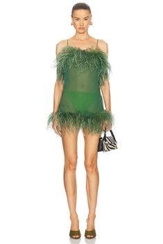 Self 1: 100% polyester, Self 2: 100% real feather.  Made in Italy.  Dry clean only.  Unlined.  Garment is intentionally sheer, undergarments will show through., Please note undergarment not included.  .  .  .  .  .  .  .  .  .  .  . Summer Cocktail Mini Dress With Feather Trim, Summer Sleeveless Dress With Ostrich Feathers, Sheer Summer Dress For Costume Party, Summer Party Dresses With Ostrich Feathers, Summer Feathered Fitted Dress, Flirty Summer Dress With Feather Trim, Fitted Summer Dresses With Feathers, Fitted Feather Summer Dress, Summer Party Mini Dress With Ostrich Feathers