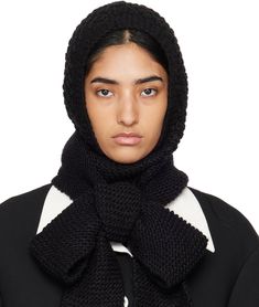 Textured knit and purl knit acrylic- and wool-blend beanie in black. Self-tie scarf-style fastening. Available exclusively at SSENSE. Supplier color: Black Winter Black Knitted Bonnet, Black Knitted Winter Bonnet, Winter Knitted Black Bonnet, Black Bonnet For Cold Weather, Black One-size Bonnet For Cold Weather, Black One Size Bonnet For Cold Weather, One-size Black Bonnet For Cold Weather, Black Winter Scarves, Warm Black Winter Scarf