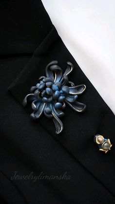 How I like black flowers with a blue tint😍
Today I bring to your attention this wonderful black Chrysanthemum. Suitable for both women and men under an elegant suit. The brooch is made of polymer clay and decorated with labradorite.
I used white pastel to highlight the petals, blue pigment for the shade.

Chrysanthemums usually symbolize longevity, loyalty, joy and optimism. Black chrysanthemum is a royal color, symbolizes nobility, virtue and noble blood. Elegant Blue Brooch With Handmade Flowers, Elegant Handmade Flower Brooches As Gift, Formal Blue Handmade Brooches, Elegant Handmade Flower Brooches For Gifts, Elegant Brooches With Handmade Flowers As Gift, Unique Flower Brooches For Formal Occasions, Handmade Elegant Formal Lapel Pin, Elegant Handmade Lapel Pin As Gift, Elegant Handmade Formal Lapel Pin