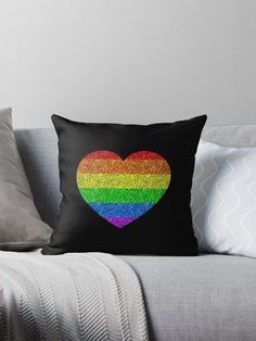 a rainbow heart on black background throw pillow