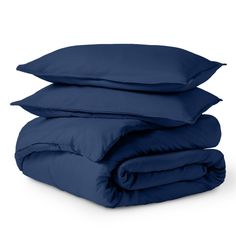 three blue pillows stacked on top of each other