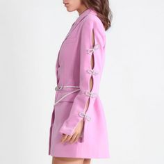 This blazer dress features a collar, sleeve cuts with rhinestone bows, and a pearls belt. Crafted from quality fabric, this dress is designed to give you a regular fit.Fabric: Cotton, Polyester. SIZE (cm) SHOULDER BUST WAIST HIPS SLEEVE LENGTH S 39 88 72 96 59 76 M 40 92 76 100 60 77 L 41 96 80 104 61 78 XL 42 100 84 108 62 79 SIZE (inch) SHOULDER BUST WAIST HIPS SLEEVE LENGTH S 15.35 34.65 28.35 37.80 23.23 29.92 M 15.75 36.22 29.92 39.37 23.62 30.31 L 16.14 37.80 31.50 40.94 24.02 30.71 XL 16.54 39.37 33.07 42.52 24.41 31.10 Chain Blazer, Blazer With Belt, Pearl Belt, Bow Belt, Pearl Dress, Rhinestone Bow, Pink Blazer, Swimwear Cover Ups, Fashion Fits