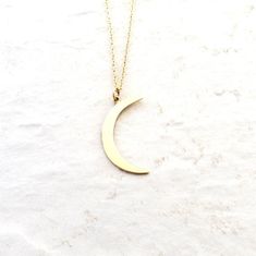 Solid bronze crescent moon pendant is hung on 14K Gold Filled chain. A simple celestial jewelry piece for everyday wear.Moon measures just over 1 inch tall (27mm).Necklace in pictures is 16 inches (40.64).As a symbol, the moon represents clarity and reflection. Her wisdom is gained through quiet introspection and contemplation of self as she reflects the light of the sun.\\\What is gold-filled?///Gold filled components are made in the USA and have a thick layer of gold. It is bonded to an inner 14k Gold Crescent Sun And Moon Necklace, 14k Gold Crescent Necklace With Sun And Moon Design, Minimalist Jewelry With Moon Charm, Minimalist Half Moon Phase Necklace, Everyday Celestial Half Moon Necklace, Minimalist 14k Gold Half Moon Necklace, Everyday Minimalist Crescent Necklaces, Everyday Half Moon Phase Necklace, Celestial Half Moon Necklace For Everyday