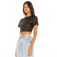 From Revolve Details: Size: M Black Short Sleeve Crew Neck Crop Top Super Versatile Faux Leather Fabric. Hidden Back Zipper Closure Trendy, Crop, Daybreaker, 55% Polyurethane, 45% Poly. ** No Tag, But Has Never Never Worn. Smoke & Pet Free Home!! Chic Faux Leather Tops For Club, Trendy Faux Leather Tops For Night Out, Chic Leather Tops For Summer, Spring Faux Leather Tops For Night Out, Edgy Leather Tops For Spring, Edgy Leather Tops For Night Out, Casual Faux Leather Top For Night Out, Edgy Faux Leather Top For Night Out, Casual Leather Tops For Night Out