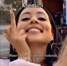 a woman making the peace sign with her hand and saying gemini was born to please nobody, f k y'all