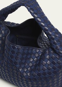 "Find BOTTEGA VENETA Large Hop Denim Hobo Bag on Editorialist. The Bottega Veneta \"Hop\" hobo bag is crafted from denim intrecciato cotton and leather. It features a shoulder strap, a foldover flap top with an interior zip pocket, and measures approximately 9.4\"H x 21.2\"W x 5.1\"D. Made in Italy." Designer Blue Bags With Braided Handles, Luxury Blue Shoulder Bag With Braided Handles, Blue Woven Leather Top Handle Shoulder Bag, Designer Blue Shoulder Bag With Braided Handles, Designer Blue Shoulder Bag With Woven Leather, Designer Blue Woven Leather Shoulder Bag, Designer Hobo Bag With Braided Handles, Wishlist Idea, Denim Hobo Bag