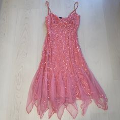 Betsey Johnson Evening Dress It's Sparkly Pink And Beautiful In Excellent Condition. It Was Only Worn Once For A Wedding And Has Been In A Protective Bag. - Size 10 - Adjustable Spaghetti Straps And Hidden Side Zipper - It Has A Mesh Net And Pink Sequin Overlay - Adorned With Tiers Of Decadently Ruffled Tulle - Has A Little Stretch T Is Approx. 48 Inches Long And 16 Inches Flat Where The Bust Line Is. Perfect For Formal Event The Pictures Don't Do It Justice #Betseyjohnson #Valentines Pink Sequin Dress, Betsey Johnson Dresses, Pink Sequin, Sequin Dress, Betsey Johnson, Formal Event, Evening Dress, Side Zipper, Spaghetti Strap