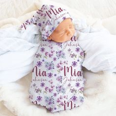 Wrap your newborn in comfort and style with our Personalized Purple Floral Baby Name Swaddle Set. This delightful ensemble includes a custom name blanket and coordinating nursery crib sheet, adorned with a captivating watercolor purple rose, violet, and wildflower repeating pattern design. Perfect for welcoming your little one home or as a thoughtful gift for a girl's baby shower, this set adds a touch of elegance to any nursery decor. Personalize the blanket with your baby's name for an extra s Personalized Fitted White Sets, Personalized Fitted White Set, Violet Nursery, Repeating Pattern Design, Swaddle Sets, Nursery Crib, Name Blanket, Purple Rose, Crib Sheets