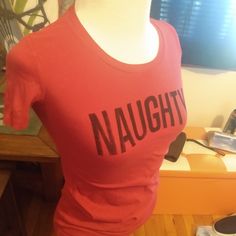 This Is A Converse All Star Baby Doll Fitted Shirt, With The Word "Naughty " On The Front Area. This Is Perfect For All Year Round And Can Also Be Specifically Used During Christmas Time For Laughs And Giggles. This Is In Brand New Condition And Is A Great Fit And Look. Great Buy For A Great Price Fitted Tops With Funny Text, Funny Red Pre-shrunk Tops, Red Pre-shrunk Tops, Red Funny Tops With Letter Print, Funny Red Tops With Letter Print, Cute Red Fitted T-shirt, Cute Fitted Red T-shirt, Fitted Short Sleeve Christmas Top, Converse Cotton Crew Neck Top