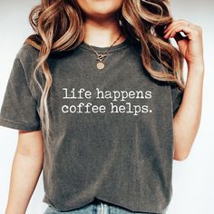 Life happens, Coffee helps!  This shirt is the perfect tee for for everyday wearing. Funny, comfy and stylish is a great gift for a friend, a mama, coffee lover or for treat yourself, this shirt is super cute and so good vibes that everybody will love it.❤ * DETAILS T-shirts: Comfort Colors - Garment-Dyed Heavyweight T-Shirt Material: 100% ring spun cotton, 20 singles Design: is applied using high quality heat transfer vinyl and is applied to each shirt with a commercial grade heat press. Model: Unisex / relaxed fit Sleeves: they are rolled up for display purposes only Printed in the USA *SIZING For sizing, please refer to the size chart in the pictures or contact us. Our t-shirts are unisex, for getting that trendy oversized look we recommend to order 2 sizes up.  *COLORS Color chart is a Coffee Color Crew Neck T-shirt For Everyday, Coffee Colored Relaxed Fit T-shirt With Slogan, Coffee Colored Text Print Crew Neck Top, Coffee Crew Neck Top With Slogan, Coffee Color Crew Neck Top With Text Print, Coffee Colored Crew Neck Top With Slogan, Coffee Color Text Print Crew Neck Top, Casual Coffee Colored Top For Everyday, Casual Coffee Colored Everyday Tops