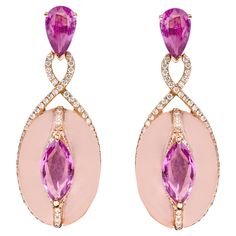 Luxury Pink Rose Cut Diamond Earrings, Luxury Pink Sapphire Earrings, Luxury Pink Round Earrings, Fine Jewelry Pink Sapphire Earrings, Luxury Oval Pink Earrings, Luxury Pink Oval Earrings, Formal Pink Earrings With Gemstone Accents, Elegant Pink Gold Pink Sapphire Earrings, Luxury Pink Drop Earrings