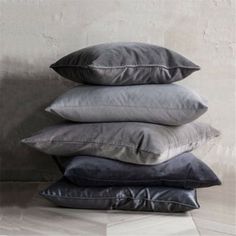 four pillows stacked on top of each other