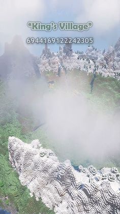 an aerial view of the mountains and clouds