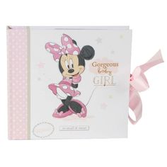 a minnie mouse greeting card with pink ribbon on the front and back of it's cover