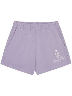 lilac purple cotton jersey texture embroidered logo at the leg thigh-length elasticated waistband two side inset pockets rear patch pocket Purple Cotton Shorts With Pockets, Purple Cotton Bottoms With Side Pockets, Casual Purple Cotton Shorts, Purple Relaxed Fit Shorts, Sporty Short Lavender Bottoms, Sporty Lavender Short Bottoms, Sporty Lavender Shorts, Lavender Cotton Shorts For Spring, Spring Lavender Cotton Shorts