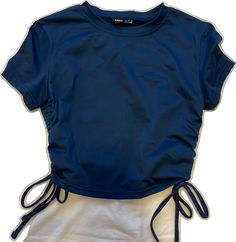 Casual Drawstring Crop Top, Trendy Navy Summer Tops, Trendy Drawstring Crop Top, Trendy Crop Top With Drawstring, Navy Stretch Tops For Summer, Sporty Summer Tops With Drawstring, Casual Blue Top With Drawstring, Fitted Short Sleeve Tops With Drawstring, Trendy Navy Stretch Top