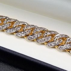 Diamond Miami Cuban Link Bracelet for Men, 7.55 Carats of Natural Diamonds, 8 3/4 inches long, 13 mm wide  HANDMADE IN NEW YORK  Bring lots of attention to your wrist wearing our breathtaking Miami Cuban link bracelet! Its masterly handcrafted in solid 10k yellow gold with highly Diamond Cuban Link Bracelet For Formal Occasions, Luxury White Gold Diamond Chain Bracelet, Luxury White Gold Diamond Bracelet With Chain, Luxury Chain Link Bracelets With Diamond Accents, Luxury White Gold Cuban Link Bracelet With Diamond Cut, Luxury White Gold Tennis Bracelet With Chain, Luxury Diamond Cut White Gold Cuban Link Bracelet, Cuban Link Diamond Accent Formal Bracelet, Luxury Curb Chain Bracelet For Formal Occasions