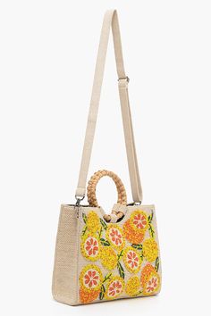 Luxe Embellished Handbag Embellishments all-over in lemon patterns Detachable long straps, round cane handles Magnetic Button closure Lined interiors with zip pocket Size : 11.5" X 9" X 3.5" An instant mood uplift with our Orange beaded handbag. Cute as a button, retro like lyrics, made for a day out in the sun, this bag loves long drives, Sunday brunches and lots of pictures. Add a pop of color to your wardrobe with this Luxe Embellished handbag. The bag is adorned with all-over lemon patterns Spring Straw Crossbody Bag With Detachable Handle, Summer Vacation Straw Bag With Handle Drop, Yellow Top Handle Straw Bag For Summer, Summer Shoulder Bag With Detachable Strap And Round Handle, Straw Bag For Daily Use In Summer, Spring Straw Bag With Detachable Double Handle, Yellow Crossbody Satchel For Summer, Handheld Straw Bag With Detachable Handle For Spring, Yellow Straw Shoulder Bag For Spring