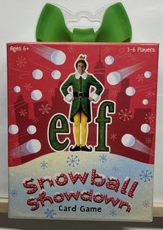 an elf christmas card game is on display in front of a white background with snowflakes