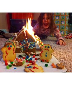 a girl looking at a gingerbread house on fire with the caption sweetie, this is how i feel about our real house, everyday