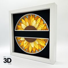 a sunflower stained glass artwork in a white frame