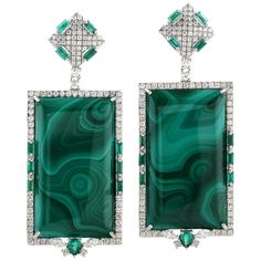 Handcrafted from 18-karat gold, these beautiful earrings are set with 1.51 carats emerald, 50.55 carats Malachite and 1.89 carats of glimmering diamonds. FOLLOW MEGHNA JEWELS storefront to view the latest collection & exclusive pieces. Meghna Jewels is proudly rated as a Top Seller on 1stDibs with 5 star customer reviews. All items manufactured by us are handmade and can be customized or redesigned. Composition Size-56X22 MM Total Weight-24.66 Gold Weight(Gms)-13.87 Diamond Wt(Cts)-1.89 Emerald Jewelry Painting, White Gold Drop Earrings, Silver Anniversary Gifts, White Diamond Earrings, White Gold Diamond Earrings, Malachite Earrings, Diamond Tiara, 18k Gold Earrings, Jeweled Earrings