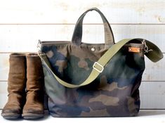 Camouflage Canvas tote bag, Waxed canvas tote bag, Military tote bag, Crossbody weekender bag or diaper bag.14 oz Waxed canvas Tote bag, messenger bag for men and women. Camouflage Waxed Canvas bag comes a removable adjustable crossbody strap or briefcase handles, Fully lined with waterproof cotton fabric and inside optional 1 ZIPPER POCKET and 5 POCKETS.1 READY FOR SHIPPING wıth BROWN LINING-This designer bag is roomy, versatile, elegant, casual, chic, completely functional, and stylish yet con Waxed Canvas Tote Bag, Back To School Bag, Camo Purse, Waxed Canvas Bag, Back To School Bags, Sustainable Bag, Sac Week End, Bike Bag, Elegant Casual