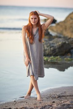 "Linen Tunic Dress, Hooded Linen Dress, Linen Summer Dress ♠ Relaxed summer midi length dress made from high quality pure linen. This tunic dress has a loose hood and a racer back, split neckline, side pockets and a pleat detail at the back. Featured in a natural warm gray shade here, this linen dress could be made in a variety of colors. ♠ If you would like a removable Slip dress in addition to your Linen dress, please check the Slips section: http://etsy.me/36T5ZQu ♠ Sizes My body Size Chart i Casual Knee-length Halter Dress For Beach, Spring Sleeveless Halter Dress For Beach, Sleeveless Halter Sundress For Beach, Sleeveless Midi Dress For Beach Cover-up, Sleeveless Sundress Halter Beach Cover-up, Sleeveless Halter Sundress As Beach Cover-up, Sleeveless Linen Beach Dress Cover-up, Spring Sleeveless Linen Halter Dress, Casual Sleeveless Linen Dress For Beach Season