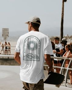 RAISED BY THE OCEAN SHIRT DARK GREEN PRINT Time to get stoked with this epic shirt. The shirt not only helps the environment but keeps you looking good. Come and join the stoked club club. ↪ From Europe? Order here https://www.surfersartshop.com/products/raised-by-the-ocean-shirt ↪ See the faces behind on Instagram @surfersartshop  **PRODUCT DESCRIPTION** - Luxurious comfort and style are what this unisex, garment-dyed shirt is all about - The unisex soft-style t-shirt puts a new spin on casual Surf T Shirt, Surf T Shirts, Ocean Shirt, Surf Brands, Surf Tee, Surfer Style