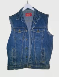 Vintage vest Denim Vest 1980s90s oversize Denim Jacket  Sleeveless  BRAND Smithys  (finnish Brand 1980-1990s) SIZE marked on item M  chest 58CM X2  lenght 69CM  CONDITION good washed blue Material Cotton denim non elasthane Lower your carbon footprint , buy recycled denim  Facts: Mens jeans weigh about 800g-1000g, womens jeans 700g-900g. Weight of the jeans is 800g:  10,000 litres of water to produce 1 kg of cotton' 8,000 litres of water produce 1 pair of jeans.  An adult drinks average of 1.25 Indian Summer Dress, Oversize Denim Jacket, 90s Denim Jacket, Vest Denim, Vintage Dress 70s, 80s And 90s Fashion, 90s Denim, Vintage Windbreaker, Vintage Vest