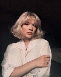 French Bob Blonde Bangs, Platinum Blonde French Bob, Short Platinum Blonde Hair With Bangs, 70s Bangs Short Hair, Short Blonde Haircuts With Bangs, Blonde Bob Aesthetic, Short 70s Hair, Short Blonde Hair With Bangs, Blonde French Bob