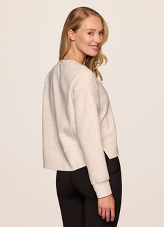 Our In The Studio Cropped Pullover combines a classic crewneck design and super soft, trendy scuba fabric for a lightweight pullover you can take from studio to street. A slightly cropped length is complemented by a relaxed fit, dropped shoulders and sporty seaming detail that allow for easy styling and layering. Throw this cute crop sweatshirt over a sports bra for a workout or pair it with jeans for a casual-cute look. Cropped Pullover, Scuba Fabric, Crewneck Design, A Workout, In The Studio, Crop Sweatshirt, The Studio, Drop Shoulder, Layering