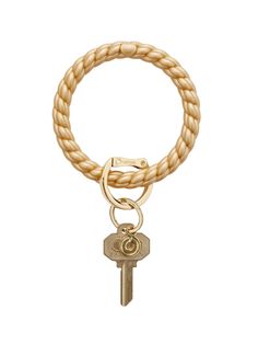 It’s the silicone Big O you know and love but with one fabulous twist… or shall we say, braid! Months in the making, the Braided Silicone Big O Key Ring flaunts a jewelry-inspired shape yet is molded from the same life-proof, non-toxic silicone we’ve all come to depend on. Inspired by timeless, woven textures, the Braided Big O functions like a key ring while looking like a chic, bangle bracelet. The Original Big O Key Ring is a one-size-fits-all bracelet key ring that can be worn on your forear Big O, Silicone Bracelets, Tickled Pink, Gold Rush, Luggage Accessories, Back To Black, Key Ring, Bangle Bracelet, Key Rings